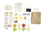 A play set featuring a cash register, play money, groceries, and decorative flowers.