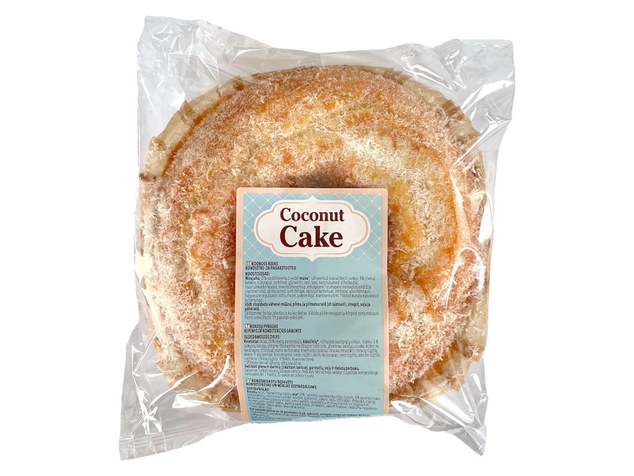 Kokosriekstu torte caurspīdīgā iepakojumā ar etiķeti vairākās valodās.