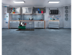 Well-organized garage with tools, storage cabinets, tires, and license plates.