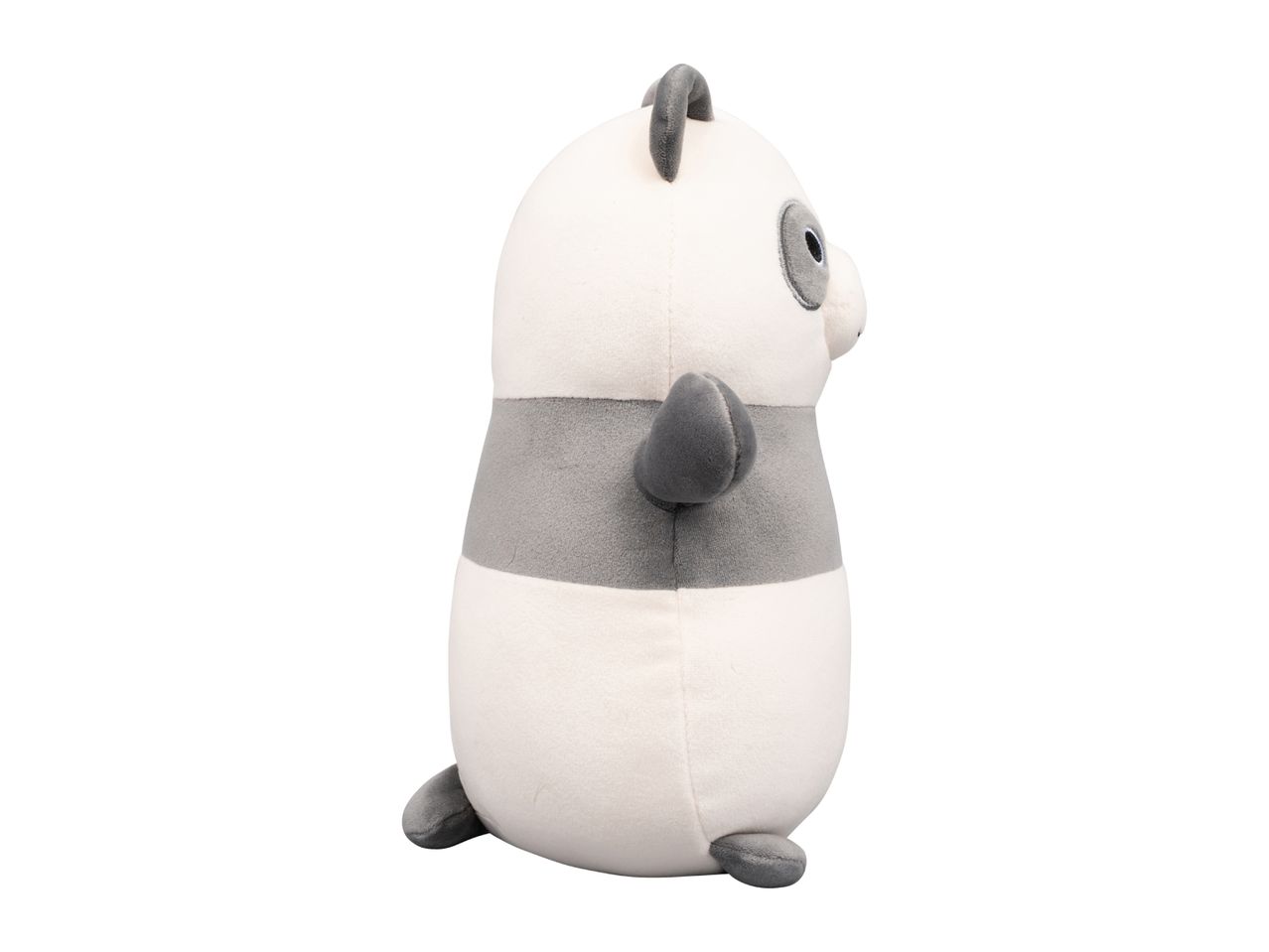 Side view of a white and grey panda plush toy