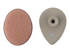 A Cien Beauty facial cleansing brush and a pink facial sponge.