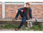 Man wearing Esmara men's winter boots, jeans, plaid shirt, and a vest, sitting on a bench.
