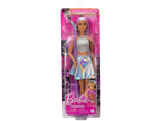 Barbie Pop Star doll with purple hair, wearing a sparkly silver top and holographic skirt.