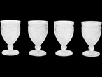 Four clear embossed wine glasses with floral pattern.