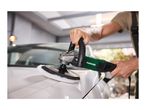 Person polishing a white car with an electric car polisher.