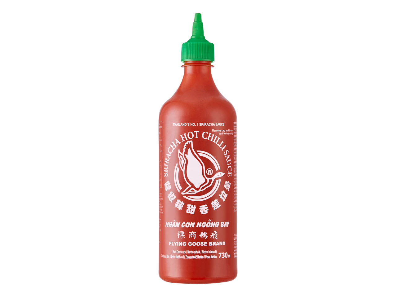 Bouteille de sauce piquante au piment rouge avec un bouchon vert.