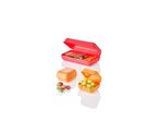 A pink bento-style lunchbox with compartments containing snacks and small food items.