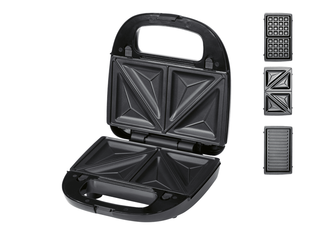 Voileipägrilli avattuna, mukana vaihdettavat vohveli- ja grillilevyt.