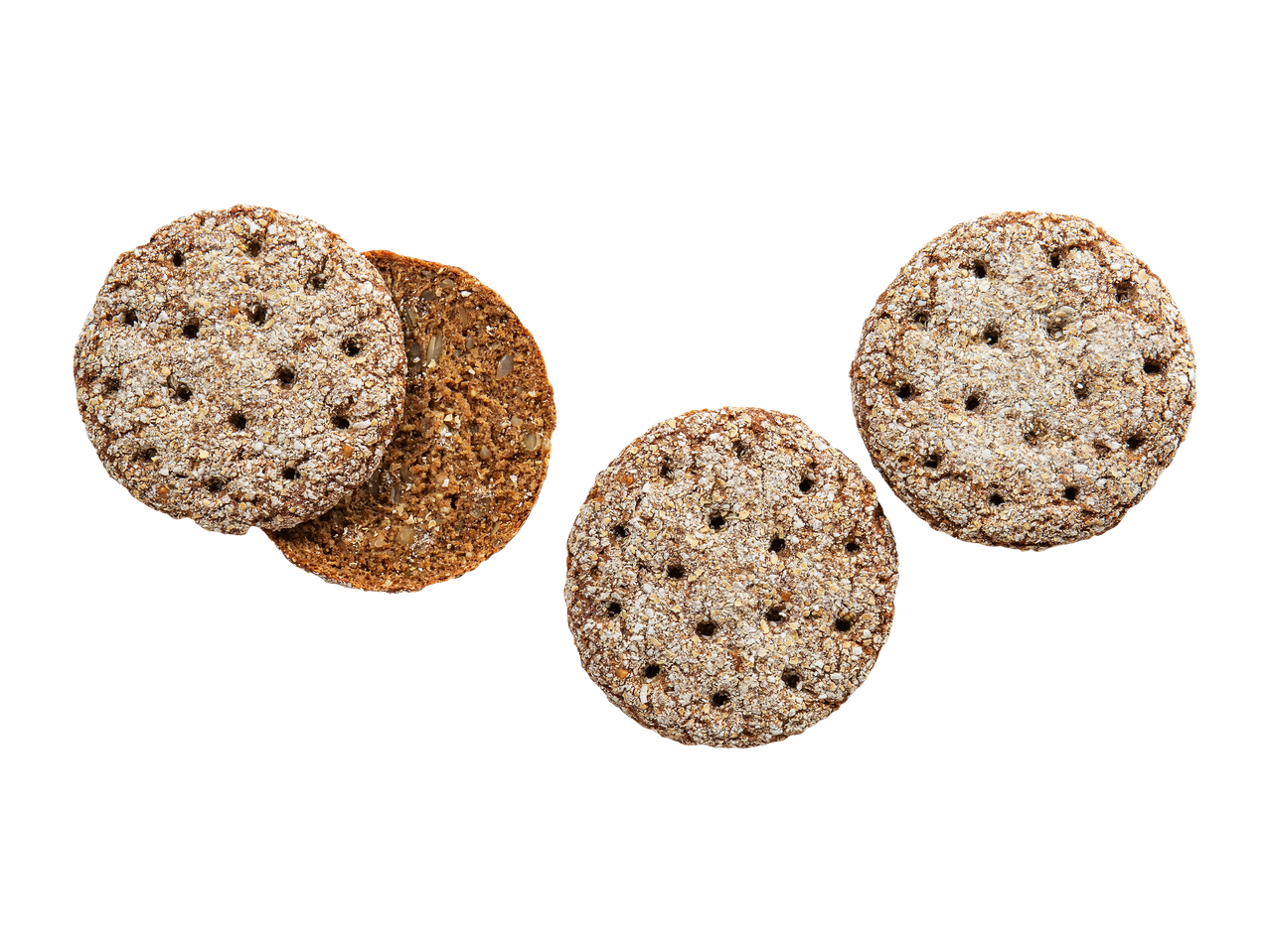 Pyöreitä, kuitupitoisia näkkileipiä, joissa on siemeniä ja reikiä, mustalla taustalla.