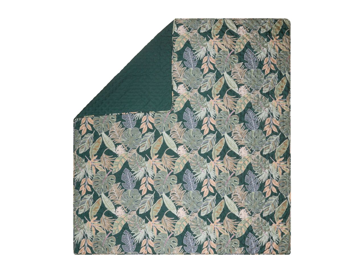 Quilted blanket with a tropical leaf pattern in shades of green, brown, and grey, with a solid green reverse.