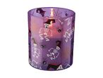 A purple Halloween candle with skeletons, spiders, and spiderwebs printed on it, glowing with a warm light.