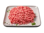 Frisches Hackfleisch auf einer grauen Platte, garniert mit Kräutern und Pfeffer.