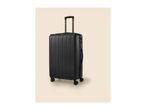 Black hard-shell suitcase with an extended handle and four wheels, standing on a light background.