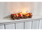 LIVARNO home autumn decoration with pumpkins, leaves, and candles on a wooden base.