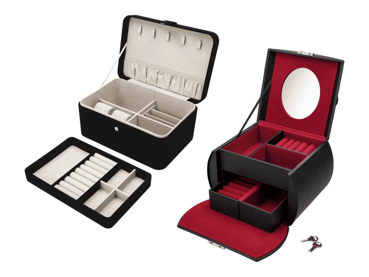 Kaksi mustaa korurasiaa, joissa on useita lokeroita ja toisessa peili.