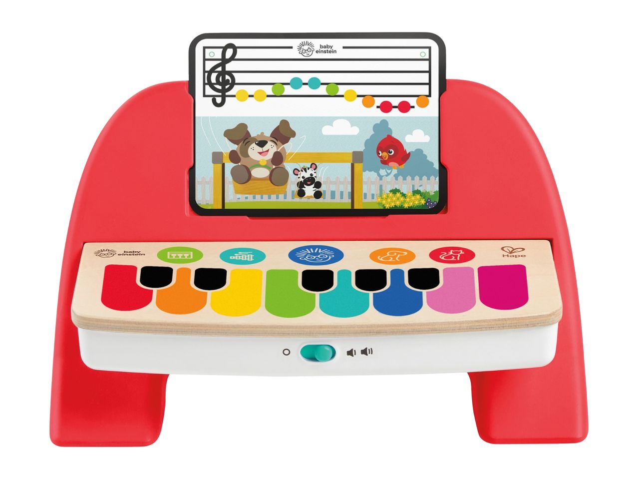 Red and white toy piano with colorful keys and a music sheet featuring cartoon animals.
