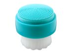 A teal silicone facial cleansing brush with a white base.