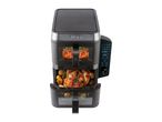 A dual-zone air fryer cooks chicken and other food.