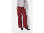 Esmara ladies' wide leg trousers in red, paired with a striped shirt and black boots.