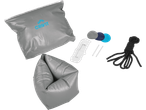 A grey inflatable bag, a folded grey inflatable item, repair patches, two white sticks, and a coiled black rope.