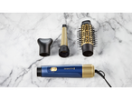 Remington hairdryer with interchangeable attachments.