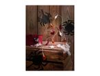 Halloween decorations with spiders, ghosts, pumpkins, and bats on wooden crates.