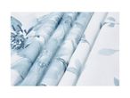 Light blue and white floral patterned fabric, folded in soft waves.
