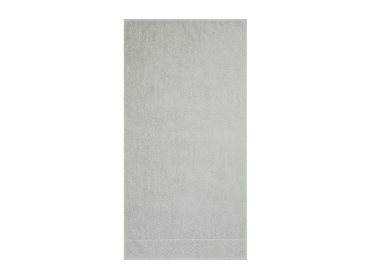A light gray rectangular rug.