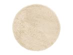 Round cream-colored shag rug with a soft, fluffy texture.