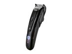 Black hair clipper with a digital display showing 100% battery and various icons.