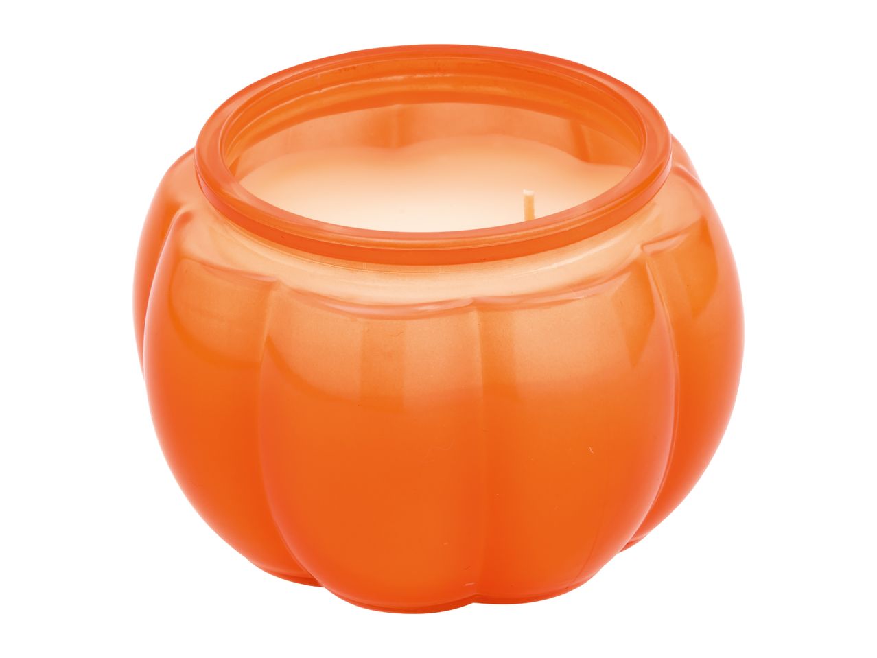 Orange pumpkin-shaped candle in a glass jar.