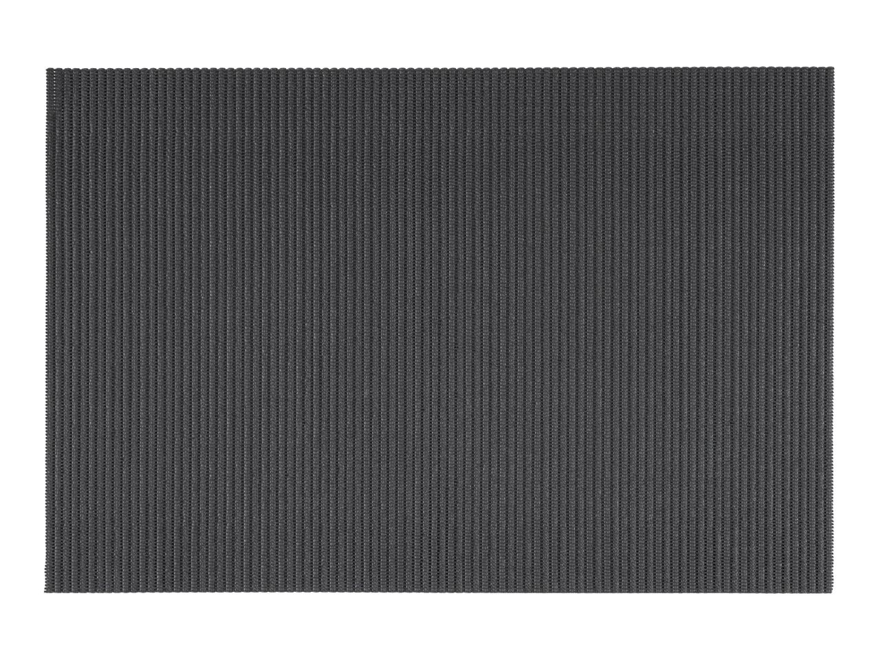 Dark grey rectangular mat with a textured, ribbed surface.