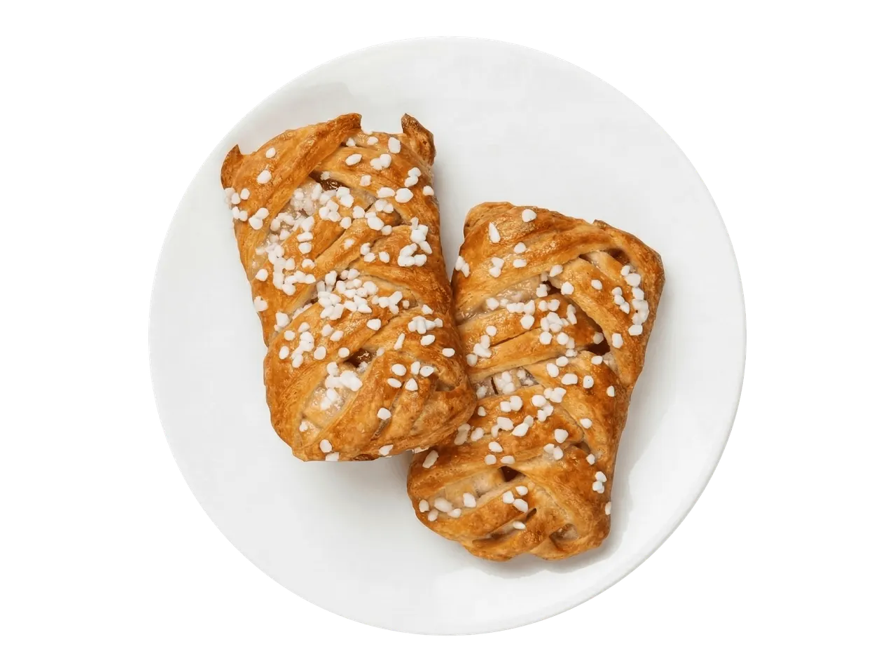 Kaksi sokerikuorrutettua leivonnaista valkoisella lautasella.