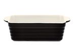 Black rectangular ceramic baking dish with a white interior