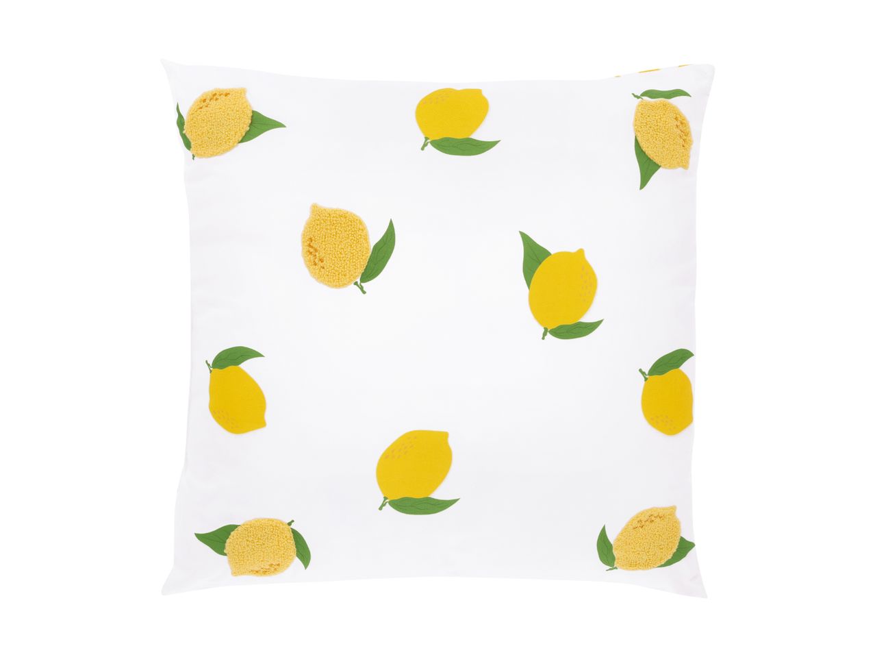 White pillow with a pattern of yellow lemons and green leaves.