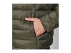 Close-up of a person's hand in the pocket of a green puffer jacket.