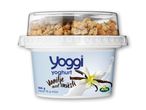 Yoghurt med vaniljesmag og müsli i en todelt beholder.