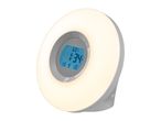 Wake-up light alarm clock with a glowing circular frame and digital display
