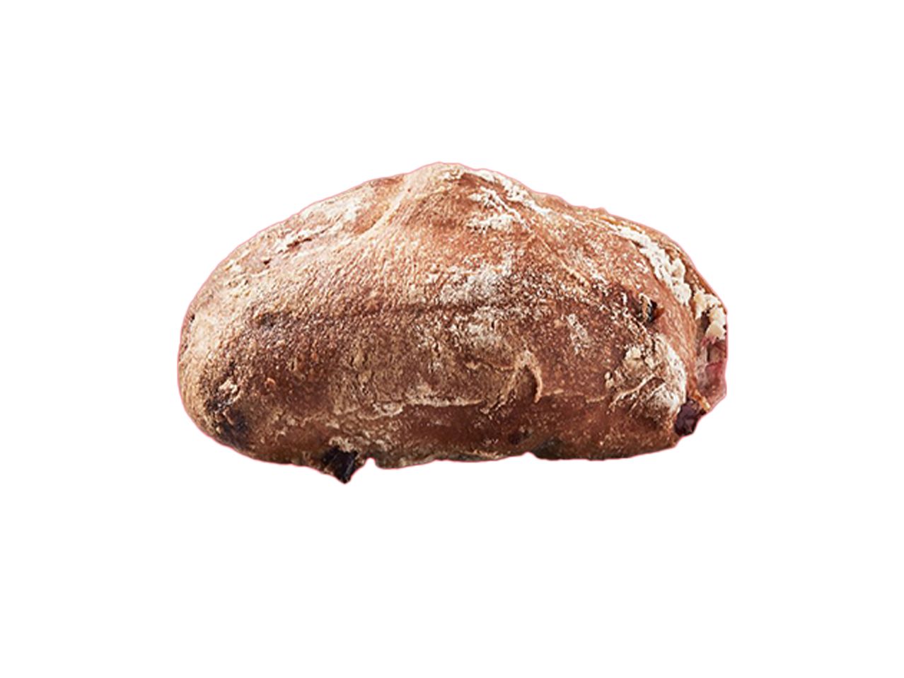 Ett rustikt, avlångt bröd med mjöl på toppen.