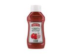 Tomato ketchup bottle with a white cap and a label showing tomatoes and nutritional information.