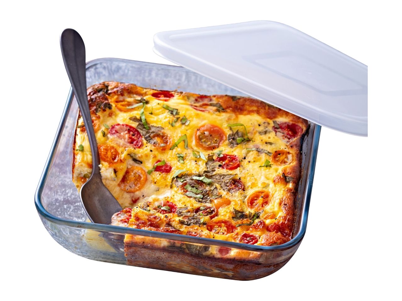 A glass baking dish with a frittata, a serving spoon, and a white plastic lid.