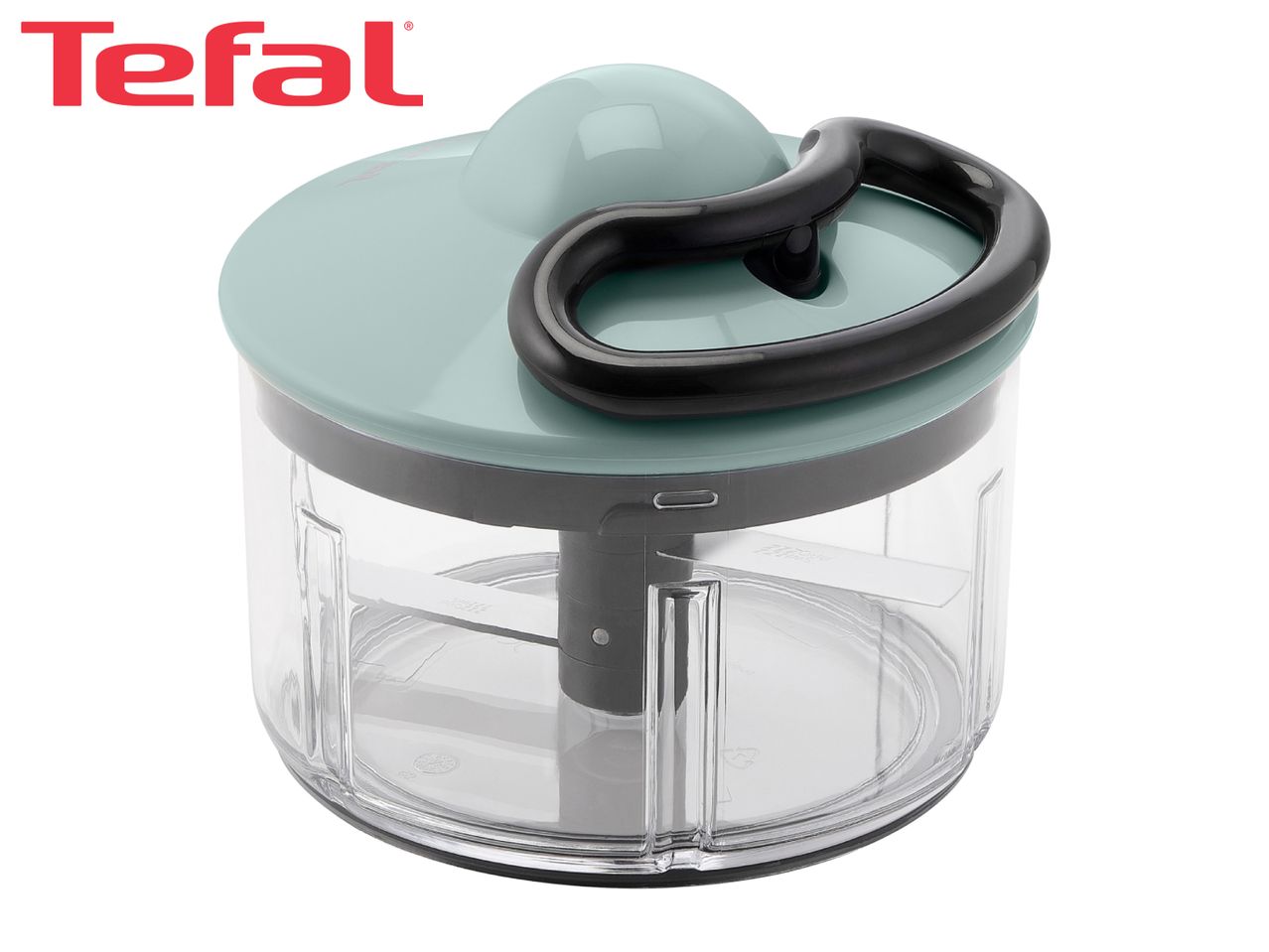 Manual food chopper with a light green lid, black pull handle, and clear bowl.
