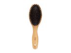 A Cien Beauty hairbrush with a bamboo handle and natural bristles.