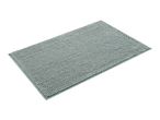A light teal bath mat with a textured surface.