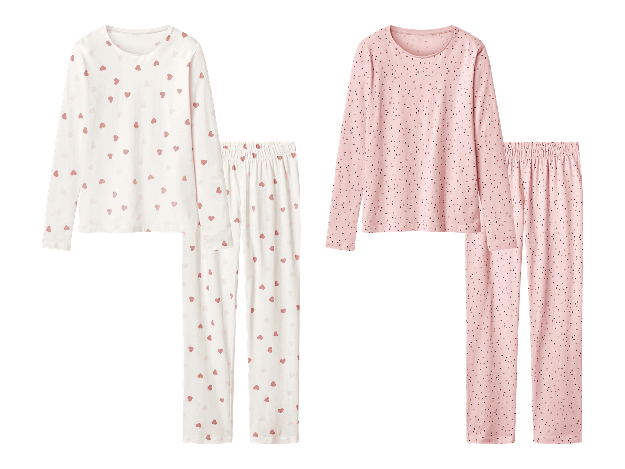 Kaksi pyjamisettiä: valkoinen sydänkuviolla ja vaaleanpunainen pilkkukuviolla.