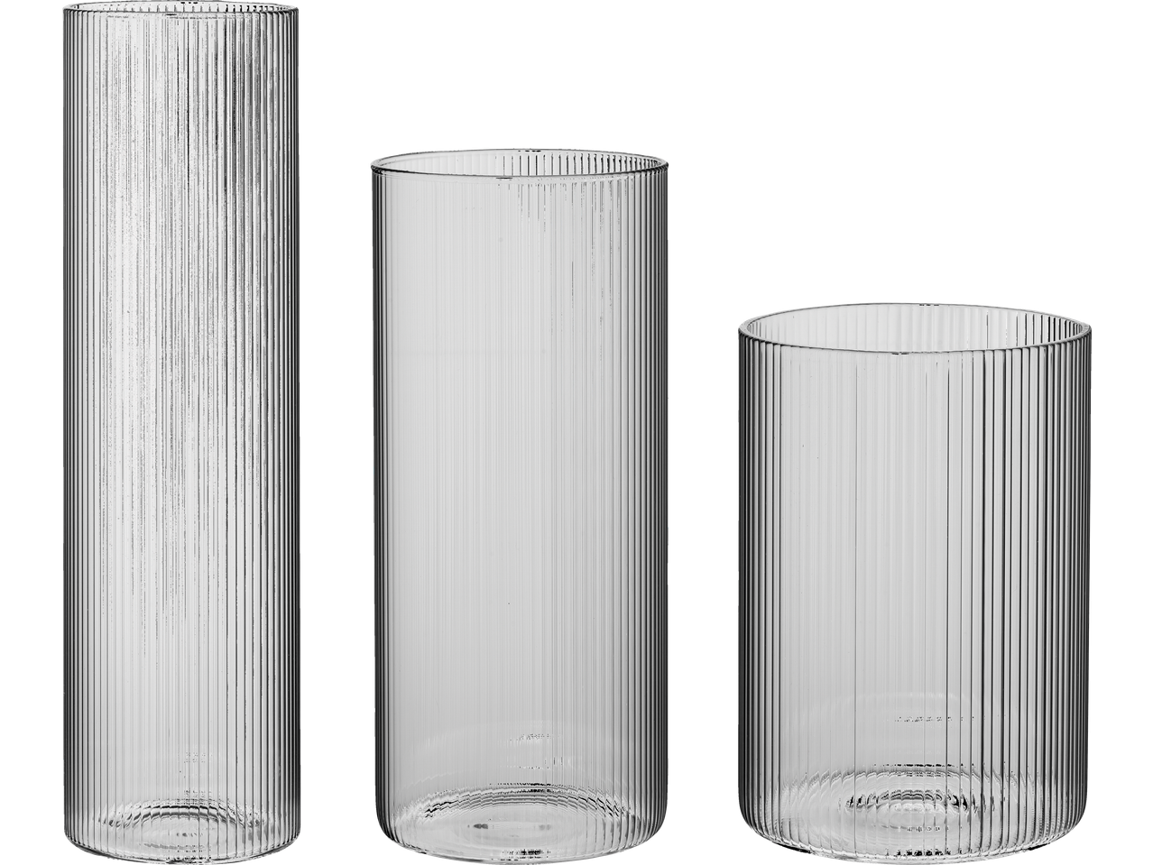 Three clear ribbed glass vases of varying heights and widths on a black background.