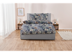 Floral bedding set on a gray platform bed in a minimalist bedroom.