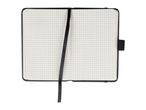 Open graph paper notebook with a black ribbon bookmark and elastic closure.