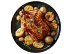 Whole roast chicken with potatoes and rosemary on a black plate