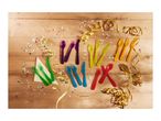 Colorful plastic cutlery and confetti on a wooden table, ready for a party.